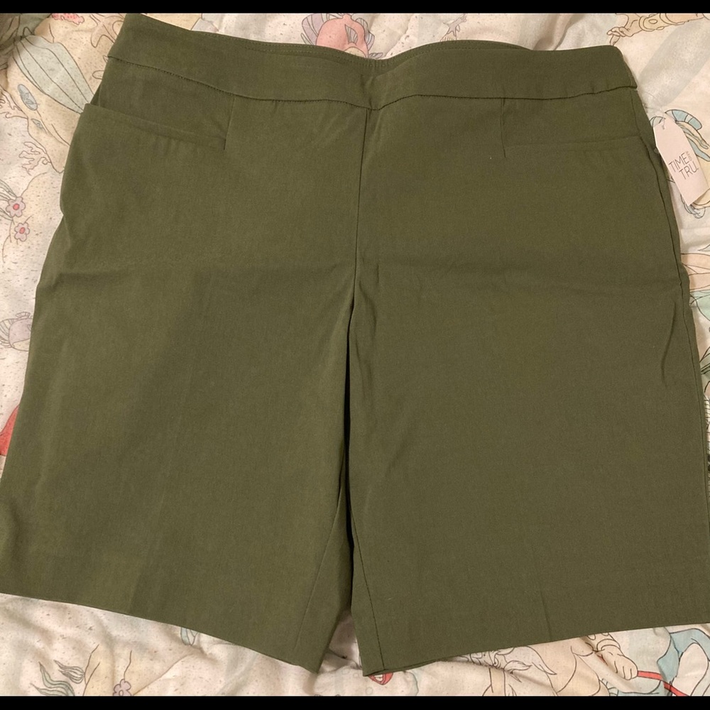 Never worn Knee length shorts! Stretch, mid rise, navy green, comfortable!